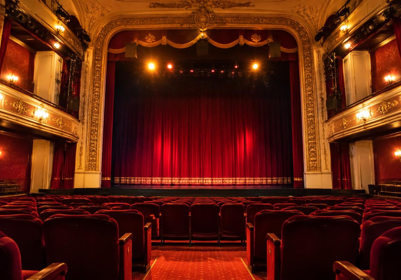 Restored historic theater interior (AI-generated image, not a specific Monroe venue)